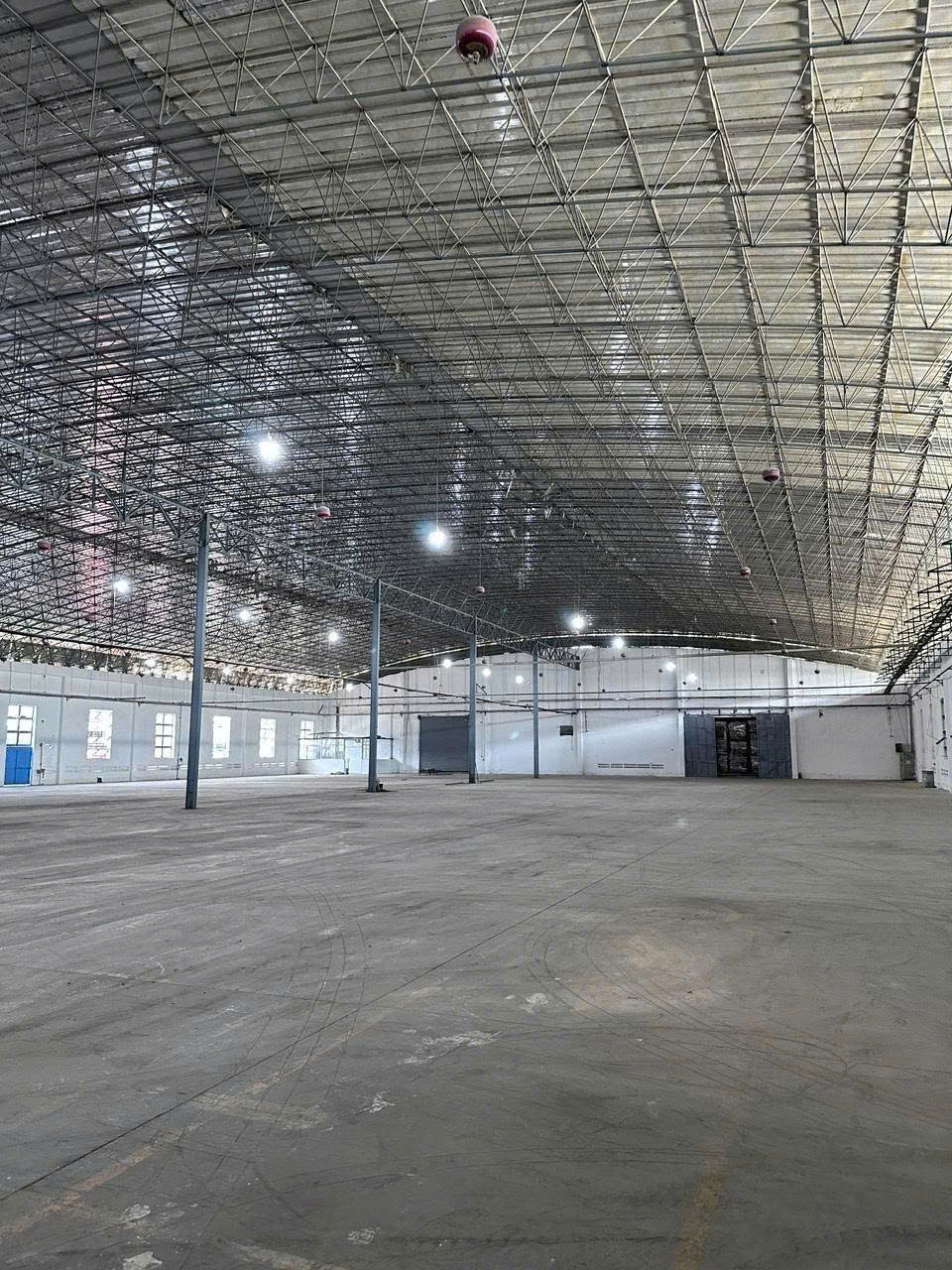 Cho thuê nhà xưởng tại KCN Nhơn Trạch 2, Đồng Nai. Diện tích 7.450m², có PCCC tự động, trạm điện 380KVA, vị trí gần cảng Cát Lái và Phước An, giá 3.8$/m²